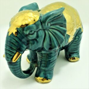 Elefante decorativo verde con dorado